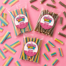 Overhead view showing everything included in Belts & Pencils Pick & Mix 3-Pack – 300g