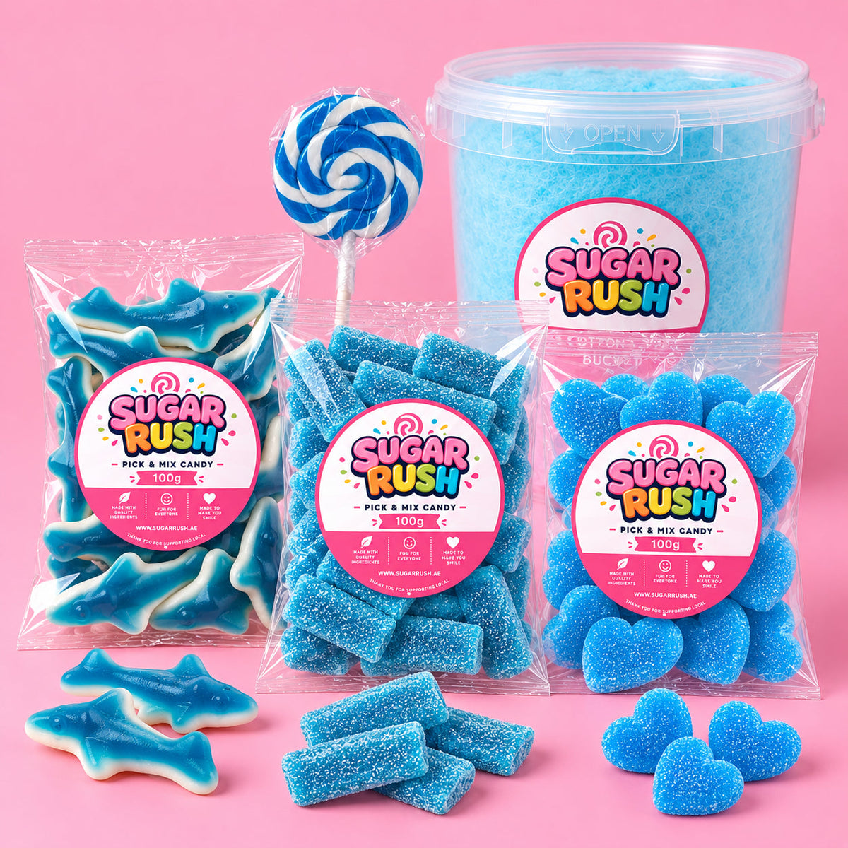 Blue Candy Bundle arranged on a pale pink Sugar Rush background