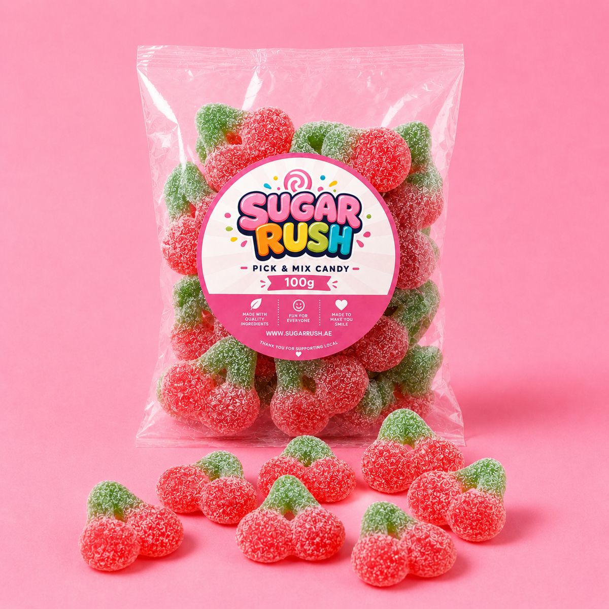 Fizzy Cherries Sugar Rush bag with sweets on pink background