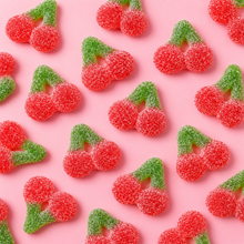 Overhead arrangement of Fizzy Cherries sweets