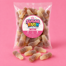 Fizzy Cola Bottles Sugar Rush bag with sweets on pink background