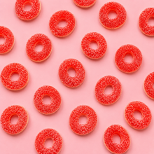 Overhead arrangement of Fizzy Strawberry Rings sweets
