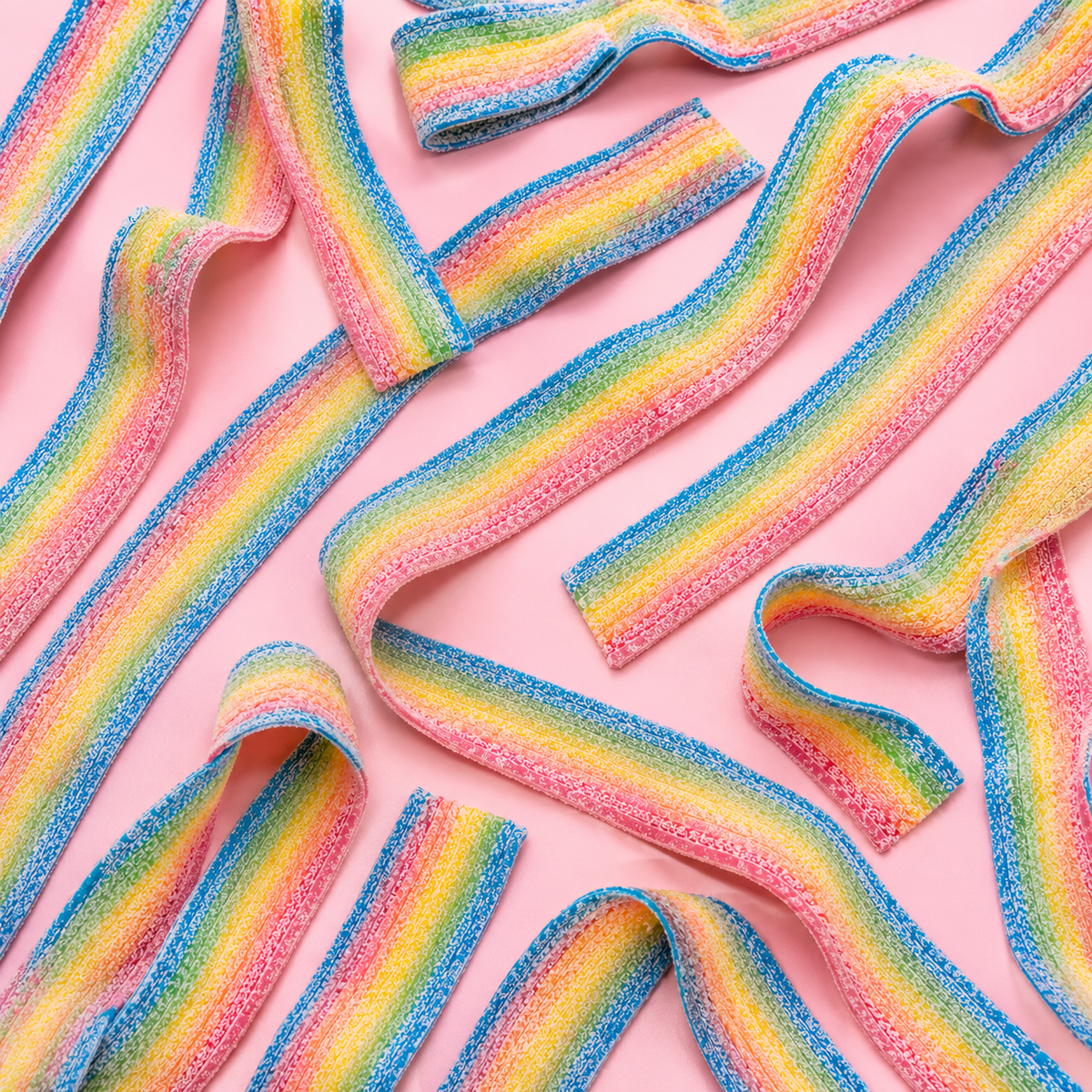 Overhead arrangement of Sour Rainbow Belts sweets
