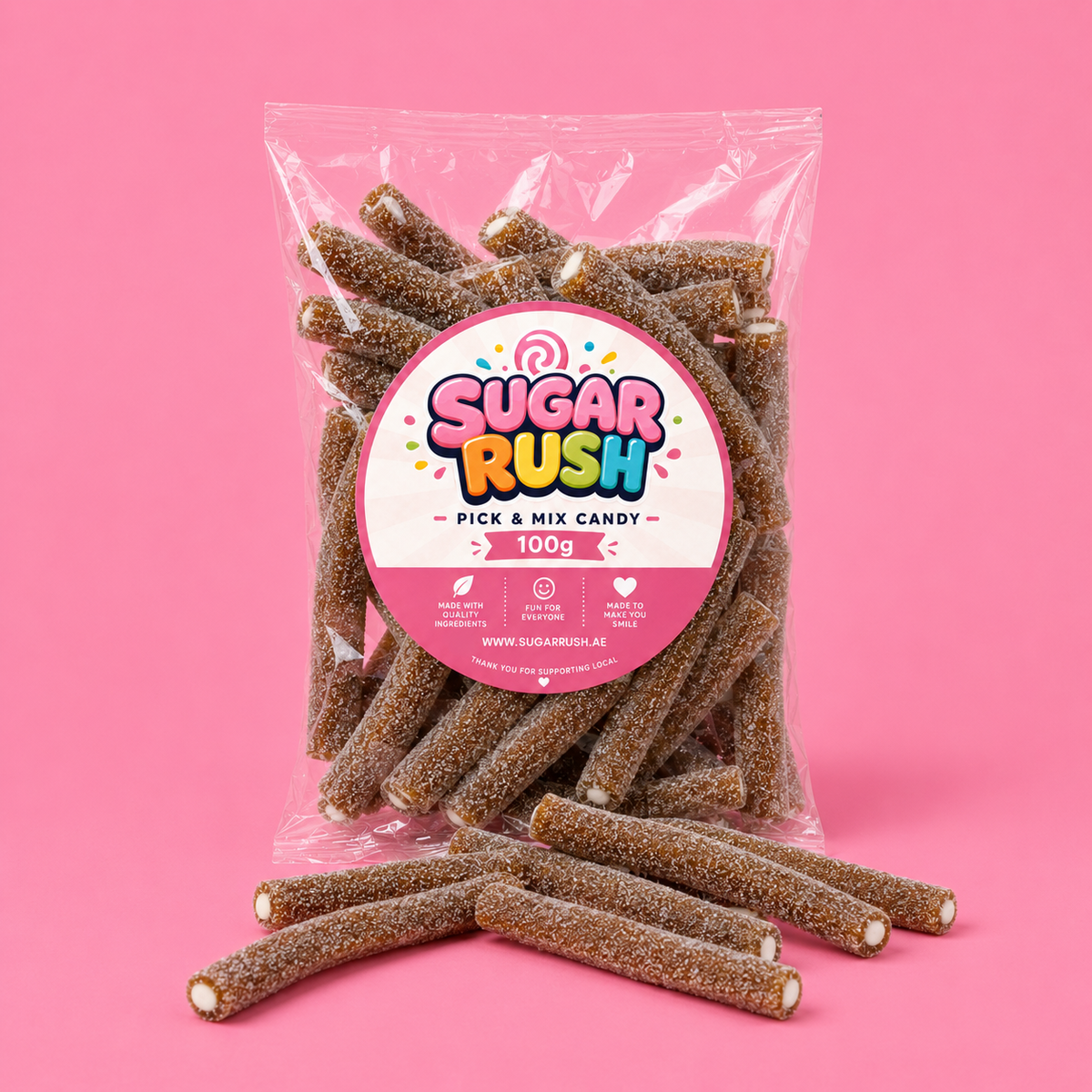 Sour Cola Filled Pencils Sugar Rush bag with sweets on pink background