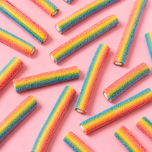 Overhead arrangement of Sour Rainbow Filled Pencils sweets