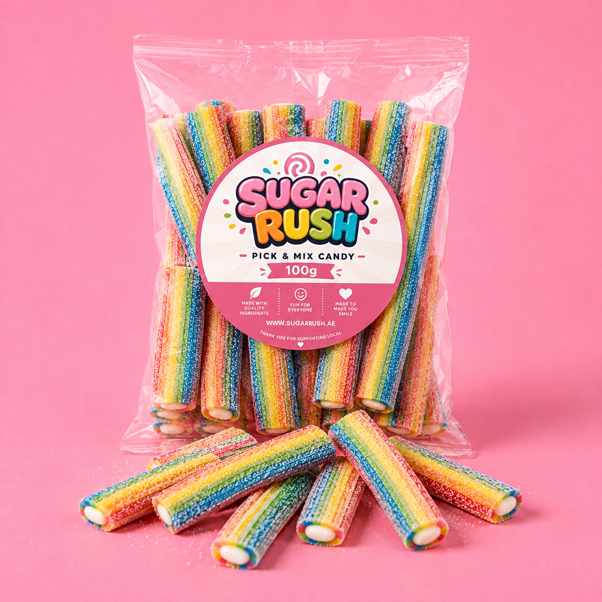 Sour Rainbow Filled Pencils Sugar Rush bag with sweets on pink background