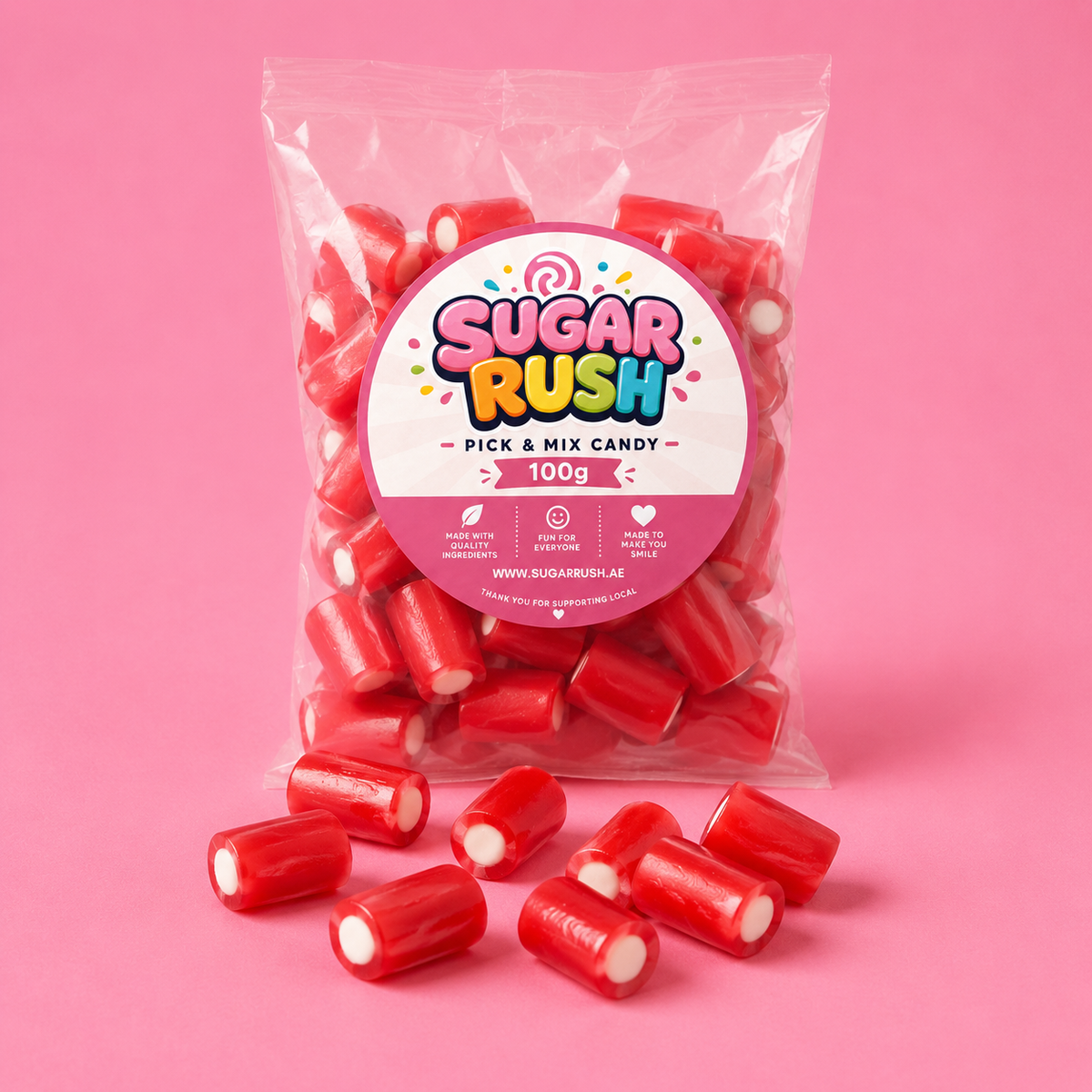 Strawberry Filled Bites Sugar Rush bag with sweets on pink background