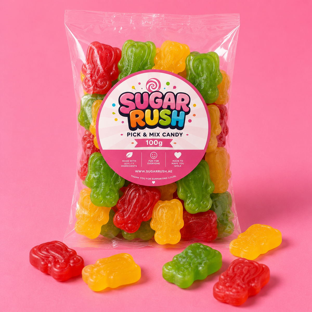 Lucky Elephants Sugar Rush bag with sweets on pink background