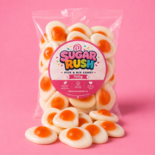 Fried Eggs Sugar Rush bag with sweets on pink background
