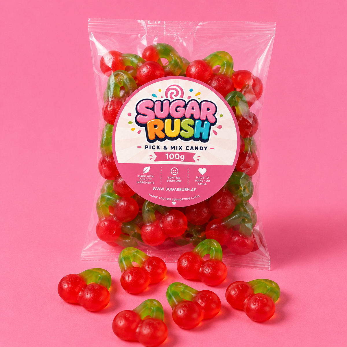 Gummy Cherries Sugar Rush bag with sweets on pink background
