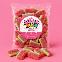 Filled Watermelon Sugar Rush bag with sweets on pink background