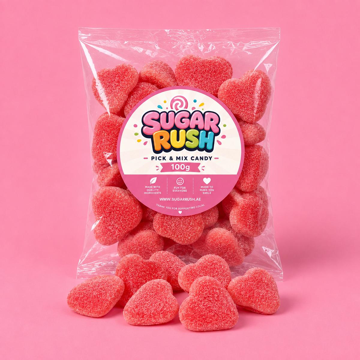 Red Filled Hearts Sugar Rush bag with sweets on pink background