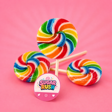 Sugar Rush Rainbow Round Lollipop styled on a pink background