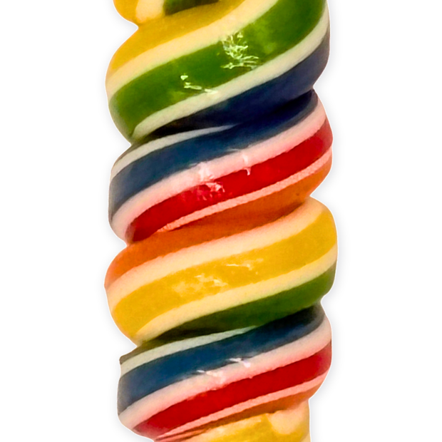 Close-up of the colourful rainbow spiral lollipop candy texture