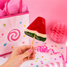 Sugar Rush Watermelon Lollipop styled on a pink background
