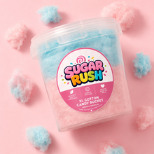 Sugar Rush XL Cotton Candy Mixed Bucket on a bright pink background with loose cotton candy