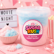 Top-down mixed-flavour cotton candy tub and fluffy pieces on pale pink